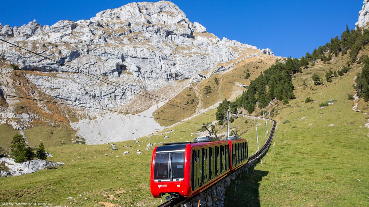 Silver_Journeys's tweet photo. What if I told you dragons once guarded this mountain… and you can ride straight to their lair?🐉⛰️🇨🇭
#MountPilatus looms over Lucerne like a medieval legend come to life — cable cars and the steepest cog railway on Earth deliver you to a summit that feels like the edge of the world. It’s the same fearless Swiss engineering that echoes America’s pioneering railroads and “because it’s there” mountain spirit. 
Surprising fact: the 48% gradient is so extreme most engineers said it couldn’t be done.
Practical gold – pro tip for fit tourists: Ride the cable car up, then hike the free trail down. You save serious cash and get the best views while everyone else is stuck in line.
Which would you rather conquer first — a dragon mountain or an American peak? 👇
Check out our Swiss TOURS https://t.co/H392HaNGNI or build you a free custom itinerary on https://t.co/CGnQuK4cTi
#LucerneAdventure #SwissAlps #AlpsAdventure #VisitSwitzerland