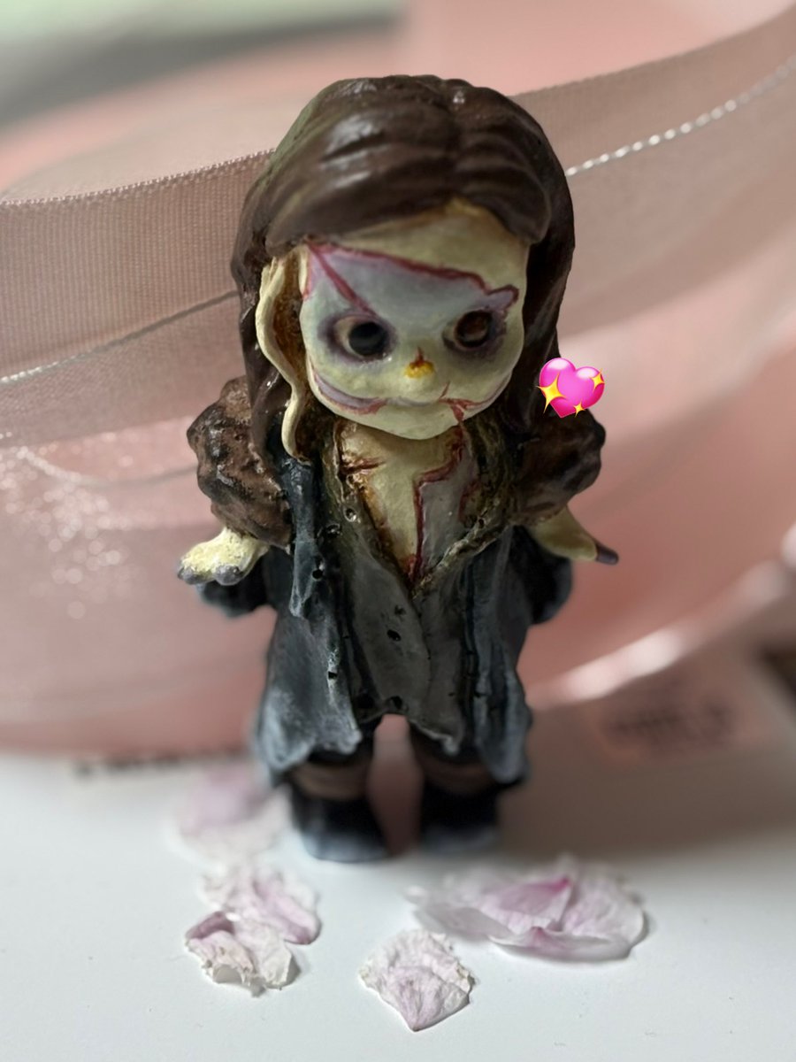 call_me_phne's tweet photo. Today is my birthday🥳 and I’ve rewatched gdt’s Frankenstein(2025) to celebrate my existence aka my survival… this film really is a true therapy session for me btw here is my cute creature with cherry blossom petals from the garden😚💕 https://t.co/TTsMphweuW