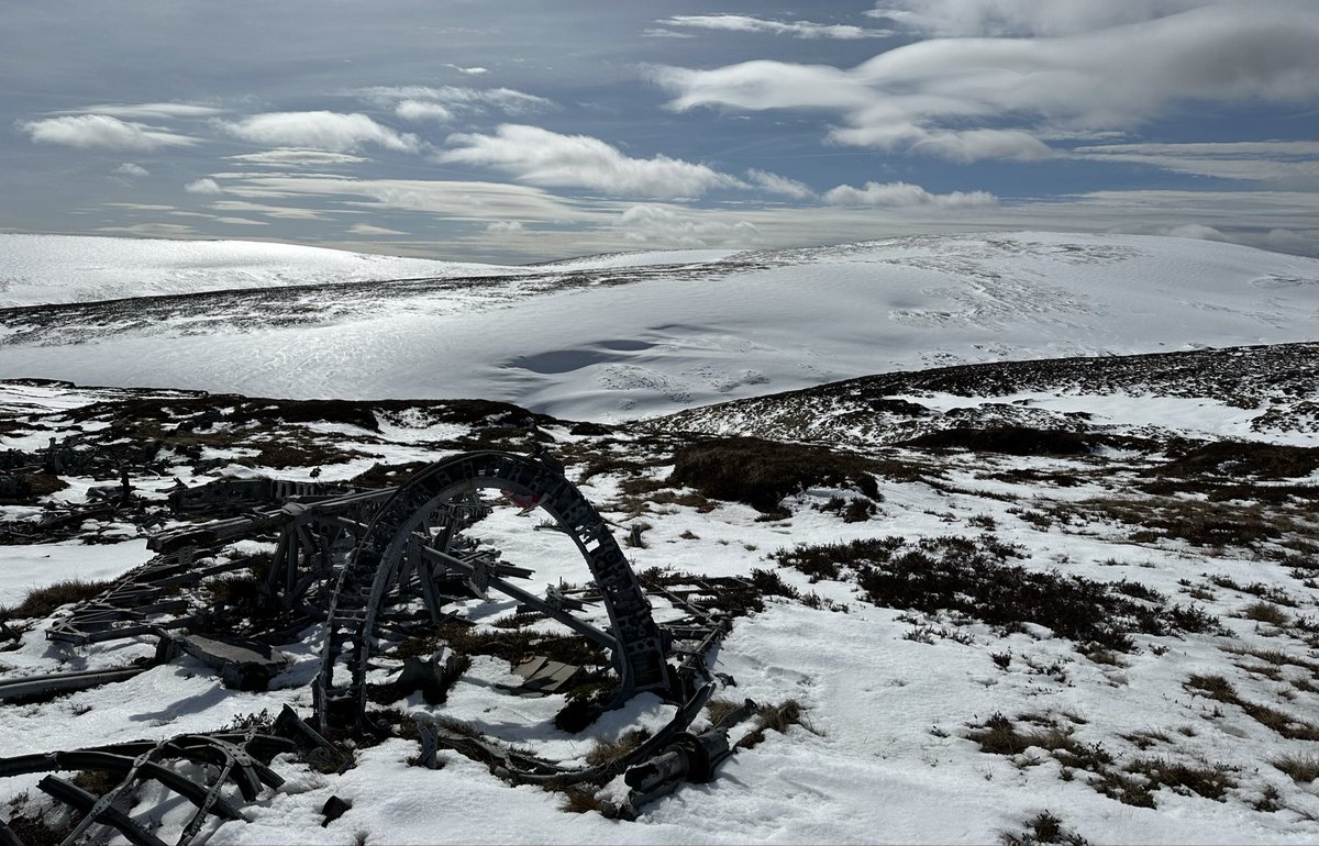 MunroMoonwalker's tweet image. Fine wander from Glen Clova over hills to visit crash site of Wellington bomber. Four crew died when plane went down in 1942 but amazingly the tail gunner survived. Sunshine and blue skies but freezing wind and substantial snow fields and cornices #scotland #mountains #aircrashes