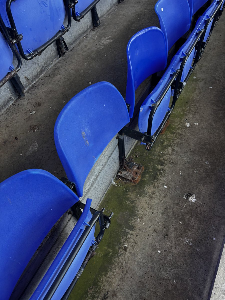 austranmere's tweet photo. A club that smells of decay. The rusty gates. The panels that have fallen off the Johnny King statue. A chairman who doesn’t turn up. A team who don’t play for the badge @TranmereRovers #TRFC #SWA https://t.co/rMvjgitAnO