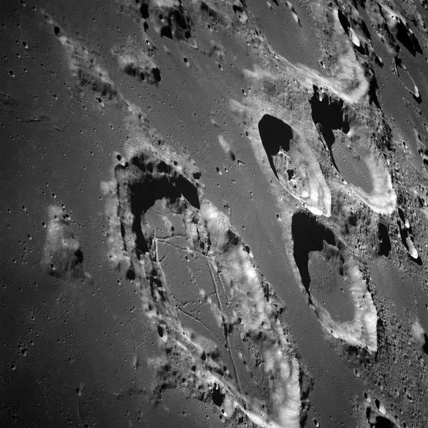 BradRTorgersen's tweet photo. A question each of us asks when we're single-digit old, is: where did the moon come from?

The currently accepted theory is that a proto-planet roughly the size of Mars smashed into the proto-Earth 4-1/2 billion years ago. The wreckage from this collision re-coalesced (over several thousand years) into the larger, permanent Earth and a smaller terrestrial that would tidally-lock (meaning one side only ever faces toward us) in orbit around the Earth.

The moon's influence on us cannot be overstated. Beyond romantic notions and colorful poetic license, the sea tides created on Earth might have been essential to early life in the oceans, and the "flexing" caused in the Earth's interior might be at least partially driving volcanoes and plate tectonics.

Without the moon above us, the Earth would be a very different place indeed.

Or, if the moon had been more massive and the Earth less massive—say, a Mercury/Mars pairing—the Earth's surface might now look very similar to the moon's: a barren topography of ancient craters and mountain ranges, all caked in a layer of ancient dust. Not enough internal radioactive decay to drive plate tectonics. And too little surface gravity to retain an atmosphere.