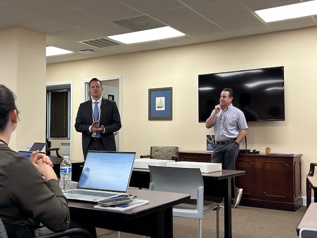 NCDOIFraud's tweet photo. Our Assistant Director Joshua Falls presented K9 Deputy Elmendorf of the Mecklenburg County Sheriff’s Office with our Partnership and Collaboration Award. 
This award recognizes individuals who make a meaningful impact in combatting fraud and protecting North Carolinians. https://t.co/K979OsIfJK