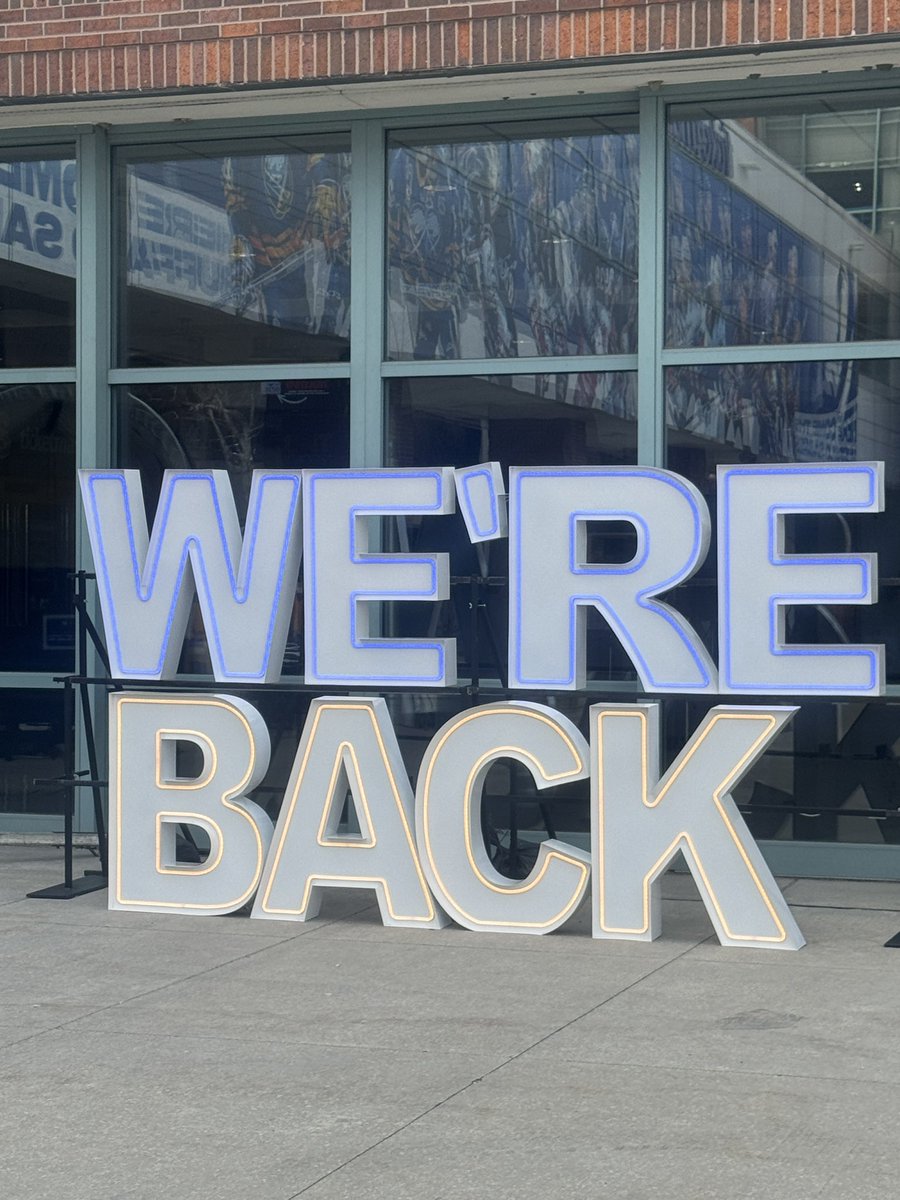 natemillssports's tweet image. #Sabres Wagon and a “We’re Back” sign propped up outside KeyBank Center before the Sabres game against the #Lightning