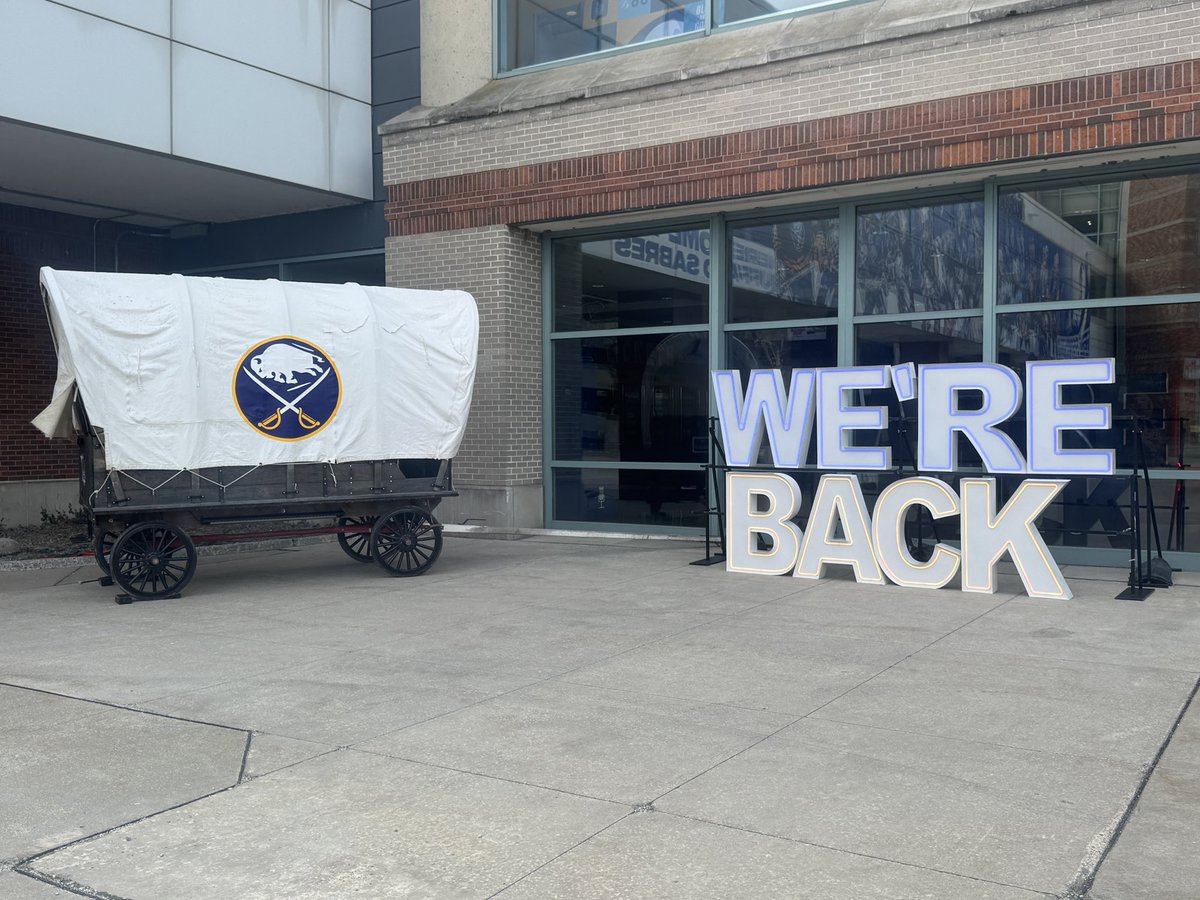 natemillssports's tweet image. #Sabres Wagon and a “We’re Back” sign propped up outside KeyBank Center before the Sabres game against the #Lightning