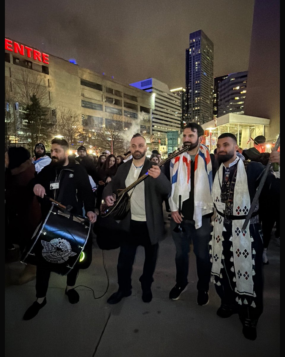 AssyrianAidCA's tweet photo. A heartfelt thank you to everyone who visited the CN Tower lighting in honour of Assyrian New Year 6776! Attendees travelled from many cities and brought flags to show their pride and celebrate 6776 years of existence. https://t.co/As7ZYKcLni