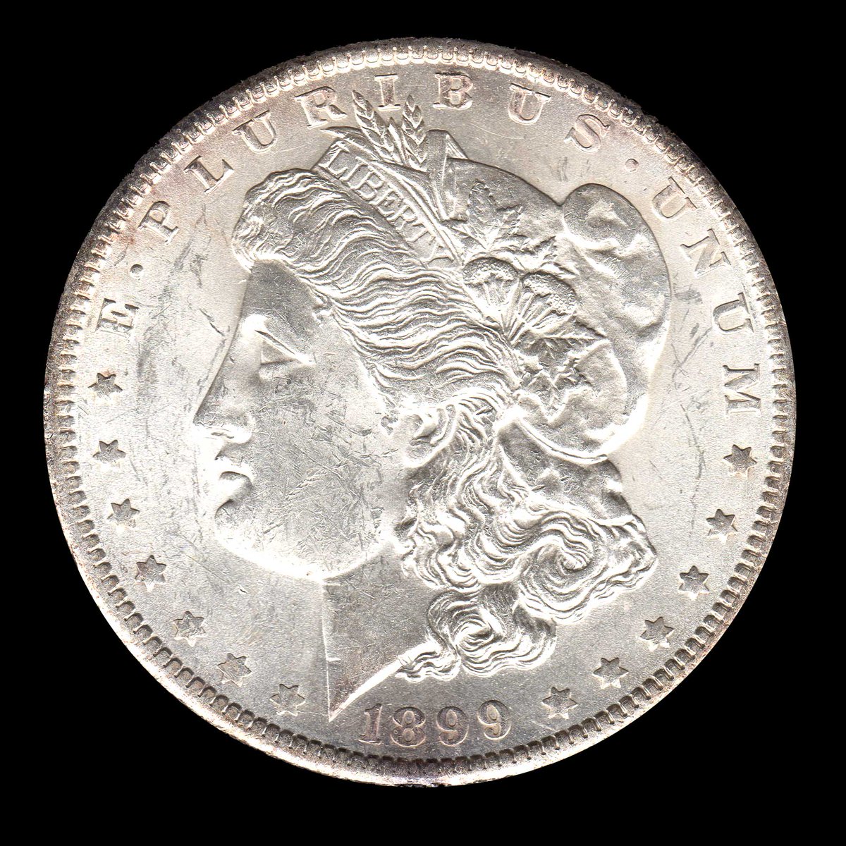 rocketdog632's tweet photo. A silver Morgan Dollar from 1899 minted in New Orleans. Very interesting old silver coin. #USA #Coin https://t.co/gQYc0YWRnP