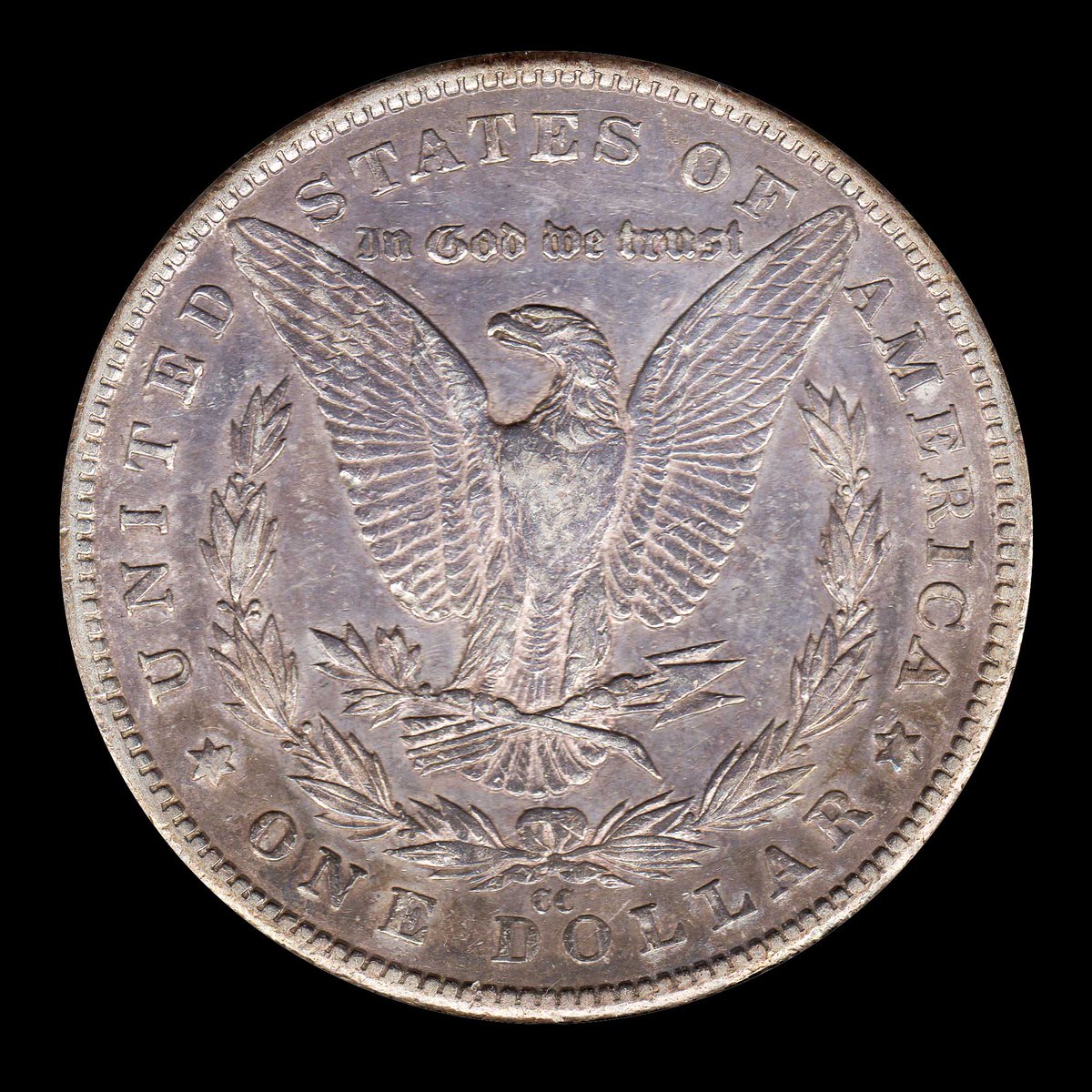 rocketdog632's tweet photo. A blackened and cleaned 1899 CC Morgan Dollar, the front may have been cleaned. Minted at the Carson City Nevada mint. Carson City is the only mint in the USA to use two letters as the mint mark in order to avoid confusion with the Charlotte Mint (C). #USA #Coins https://t.co/gNSkORXrf7