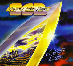 I've been listening to Sweet Comfort Band songs all afternoon while I work on redoing an old book cover.  Thanks to <a href="/Bryan_Duncan/">Bryan Duncan</a> for the great songs and memories.  If you don't know their songs, they have a huge presence on Apple Music.  And check out that album cover!