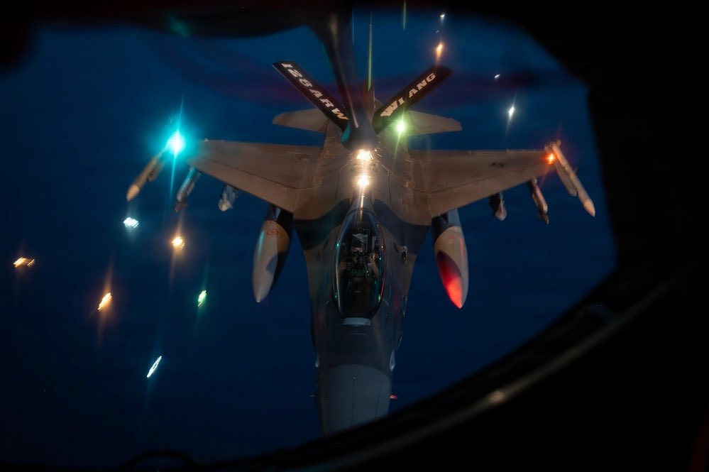 sentdefender's tweet photo. A U.S. Air Force KC-135R Stratotanker with the Wisconsin Air National Guard’s 128th Air Refueling Wing, based out of General Mitchell Air National Guard Base in Milwaukee, refuels F-16CM Fighting Falcons assigned to the 31st Fighter Wing out of the Aviano Air Base, Italy, over the U.S. Central Command Area-of-Responsibility in support of Operation Epic Fury, April 2, 2026.