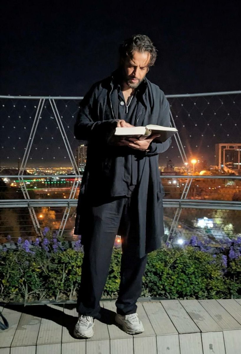 IrnaEnglish's tweet photo. As Trump threatened to bomb bridges in Iran, Iranian singer Benyamin Bahadori spent Monday night on the Tabiat (Nature) Bridge, vowing to remain there until morning. He also stated that he will do the same again tonight. https://t.co/3pfO3snrfJ