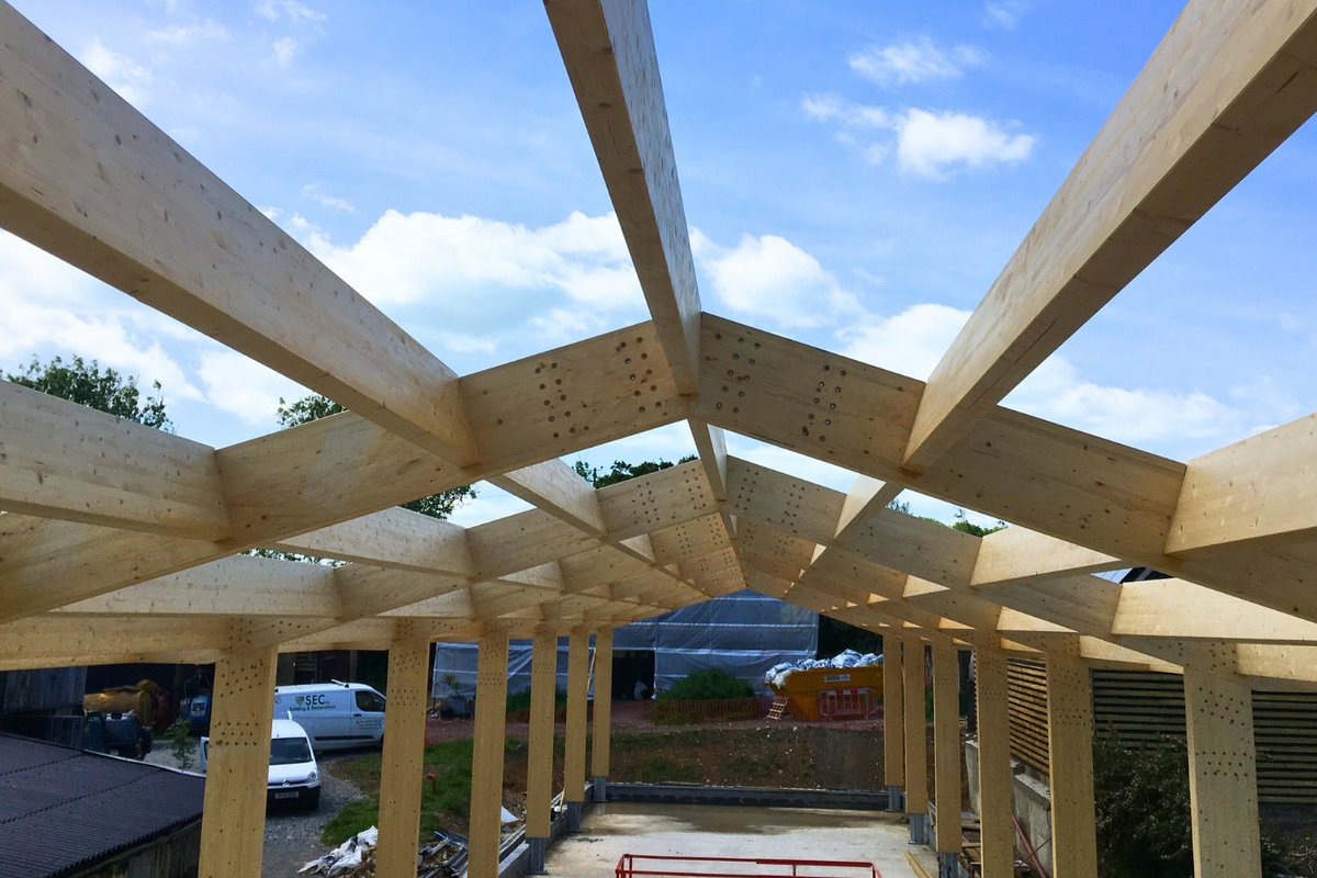 BucklandTimber's tweet photo. #Glulam structures can look complex, but they’re built from simple components. Rafters, purlins, ridge beams, trusses - once you get the basics, it all clicks. We’ve put together a simple glossary:https://t.co/V1dmCQTMsz
#TimberEngineering https://t.co/Wm4mUKEVwS