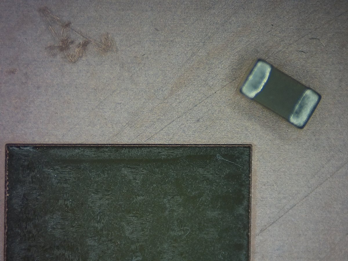 robin7331's tweet image. Removing copper with the UV laser. 
0603 (!) cap for reference. 

Doing some PCB traces, soon.
This is very promising 🕺