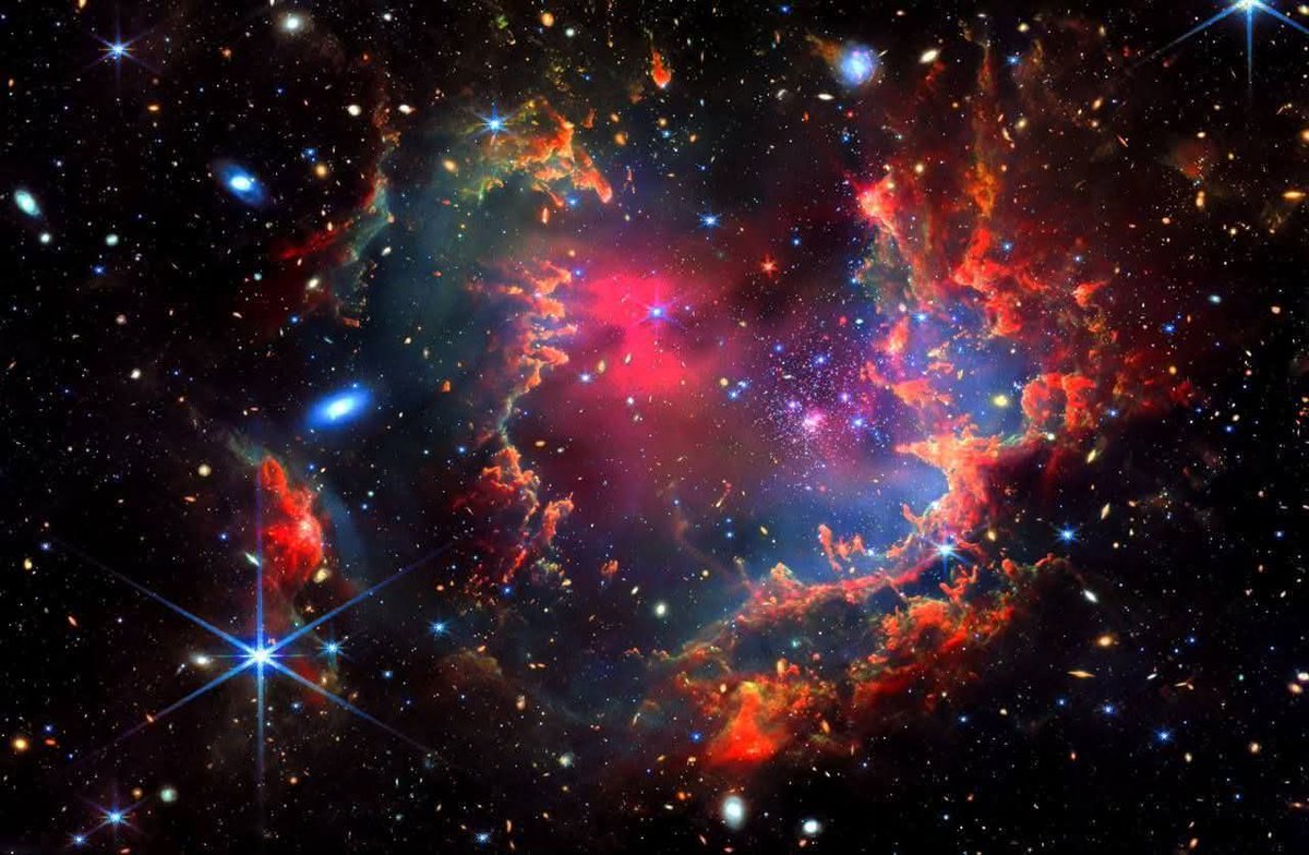 :Behold NGC 602 — a dazzling, ultra-young star cluster nestled in the ...