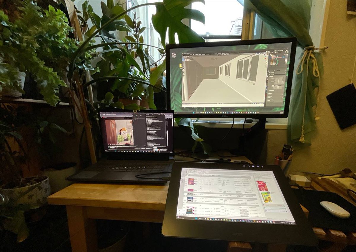 Studio__Phoenix's tweet photo. For one person, a lecture in progress isn't a reason to stop compositing (super cool, but yeah we totally don't approve... but also kinda cool.

And someone's making their workspace as cozy and personal as possible - whether it's a little green corner or a multifandom desk. https://t.co/4Z0OuW9iLs