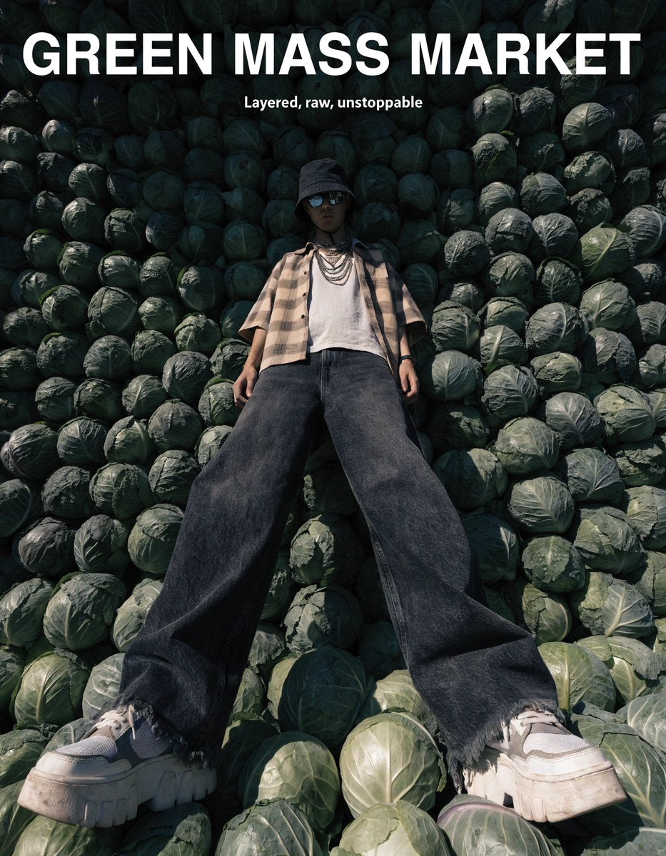 OVolosin82152's tweet photo. Harvest Mode with @recraftai 

Prompt example: 
A stylish figure standing with a wide stance, shot from a low angle so the body dominates the frame, surrounded by tightly packed cabbages covering the ground and rising behind into a textured wall, minimal empty space, strong fashion silhouette
Poster text: 'GREEN MASS MARKET'. Subtext: 'Layered, raw, unstoppable'.
