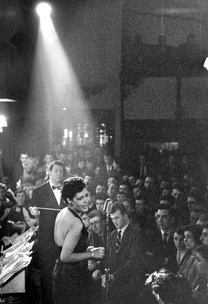 sachin and babi light blue dress American jazz singer Billie Holiday performs with a flower in her hair at  the Offbeat Club, Chicago, 1939 main image 0