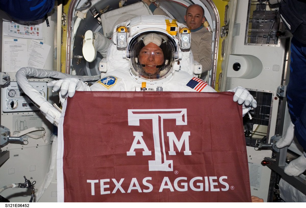 metwo2010's tweet photo. @tamusystem When Mike Fossum flew, Paul Hill ‘84 was Mission Operations Director.  Matt Leonard ‘86 and myself (‘86) helped to organize a yell practice at the Outback before Paul had the yell leaders wake up Mike with the War Hymn.  NASA is full of Aggies. https://t.co/KZawgl8NES