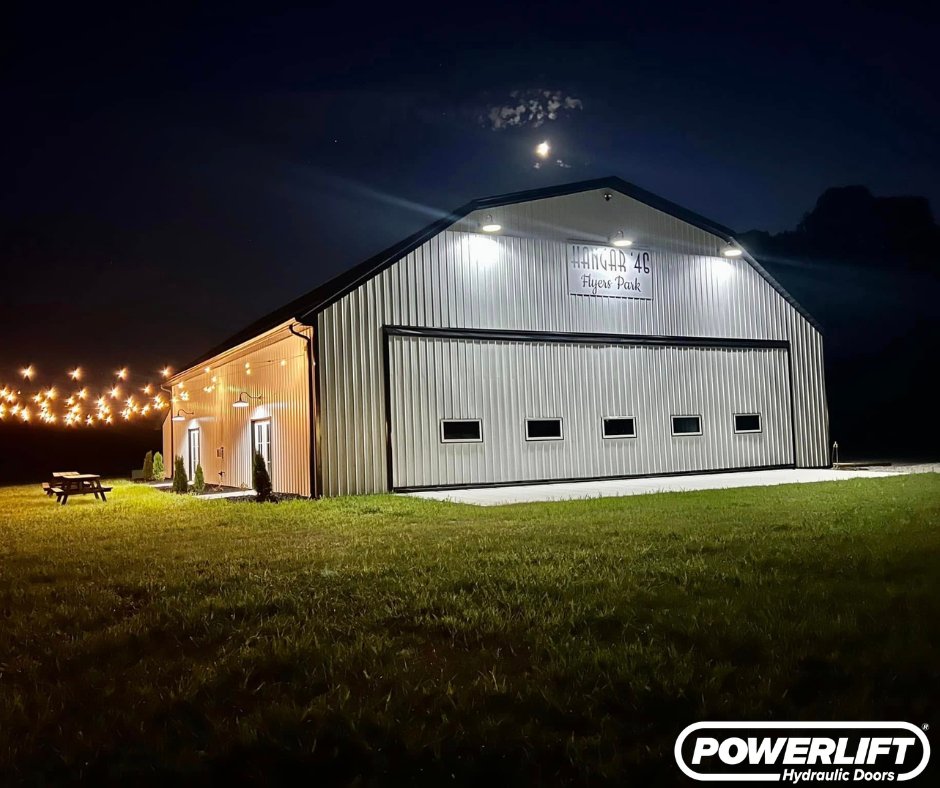 DoorsPowerlift's tweet photo. Big doors. Even bigger moments.

This 48' x 14' PowerLift Hydraulic Door at Hangar '46, a Vintage Aircraft Hangar & Wedding Venue at Flyers Park Airport in Newark, Ohio, beautifully blends aviation and celebration.

From showcasing classic aircraft to creating a stunning open-air wedding space, this door transforms the hangar into something truly unforgettable day or night.

Installed by PowerLift Doors by Metal Monkey, this project highlights how one door can elevate both function and experience.

• Expansive 48' wide clear opening for aircraft and events
• Effortless one-touch hydraulic operation
• Transforms from working hangar to elegant event space

#PowerLiftDoors #HydraulicDoors #FlyersPark #HangarLife #WeddingVenue #AviationMeetsEvents