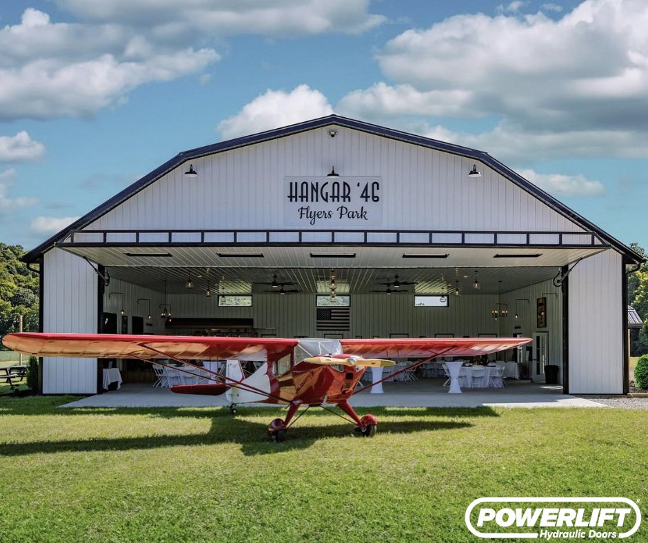 DoorsPowerlift's tweet photo. Big doors. Even bigger moments.

This 48' x 14' PowerLift Hydraulic Door at Hangar '46, a Vintage Aircraft Hangar & Wedding Venue at Flyers Park Airport in Newark, Ohio, beautifully blends aviation and celebration.

From showcasing classic aircraft to creating a stunning open-air wedding space, this door transforms the hangar into something truly unforgettable day or night.

Installed by PowerLift Doors by Metal Monkey, this project highlights how one door can elevate both function and experience.

• Expansive 48' wide clear opening for aircraft and events
• Effortless one-touch hydraulic operation
• Transforms from working hangar to elegant event space

#PowerLiftDoors #HydraulicDoors #FlyersPark #HangarLife #WeddingVenue #AviationMeetsEvents