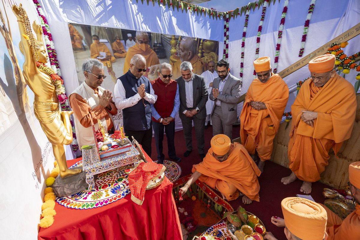NeasdenTemple's tweet photo. A sacred beginning, shared by thousands.

Yesterday at #NeasdenTemple, devotees gathered for the first shila pujan of Tapomurti Nilkanth Varni Maharaj - a deeply sacred ceremony celebrating the foundation-laying of this momentous project.

Nilkanth Varni, the teenage form of Bhagwan Swaminarayan, represents love, compassion, unwavering faith, and spiritual resolve. The Tapomurti - a serene standing murti that will rise 42 feet - will embody these divine virtues, serving as a place of reverence and reflection. It will inspire generations to come to lead lives rooted in spirituality, inner strength, and service to others.

His Holiness Mahant Swami Maharaj had sanctified the bricks for this ceremony in India a few days earlier, blessing the beginning of this devotional endeavour.

As the first bricks were placed in the foundation pit, it marked more than the start of construction; it was the commencement of a collective offering of faith, unity, and devotion.