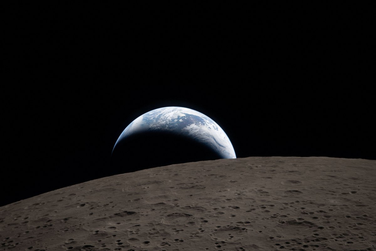 reuterspictures's tweet photo. A view of Earth, partially hidden behind the Moon, captured through the Orion spacecraft window at 6:41 pm EDT April 6, 2026, during the Artemis II crew's lunar flyby https://t.co/v8yGpRjt3x https://t.co/mevqqbOyVd