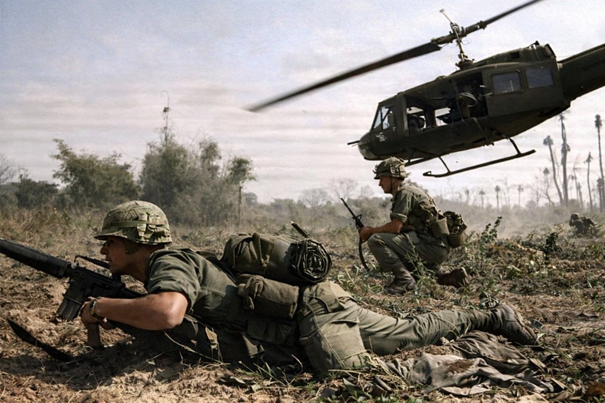 VoicesfromNam's tweet image. Combat operations at Ia Drang Valley, Vietnam, November 1965. Major Bruce P. Crandall's UH-1D helicopter climbs skyward after discharging a load of infantrymen on a search and destroy mission.