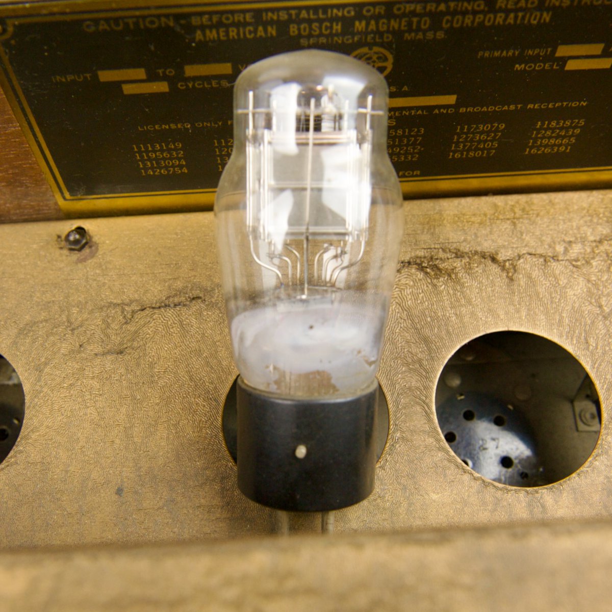 TubeAmpTinker's tweet photo. Before powering up vintage vacuum tube gear it's worth checking if the silver-gray 'getter' spot has turned chalky white indicating a loss of vacuum.  At best they will light up for an instant and fail, at worst they will damage your gear. https://t.co/3ILbsuaz8e