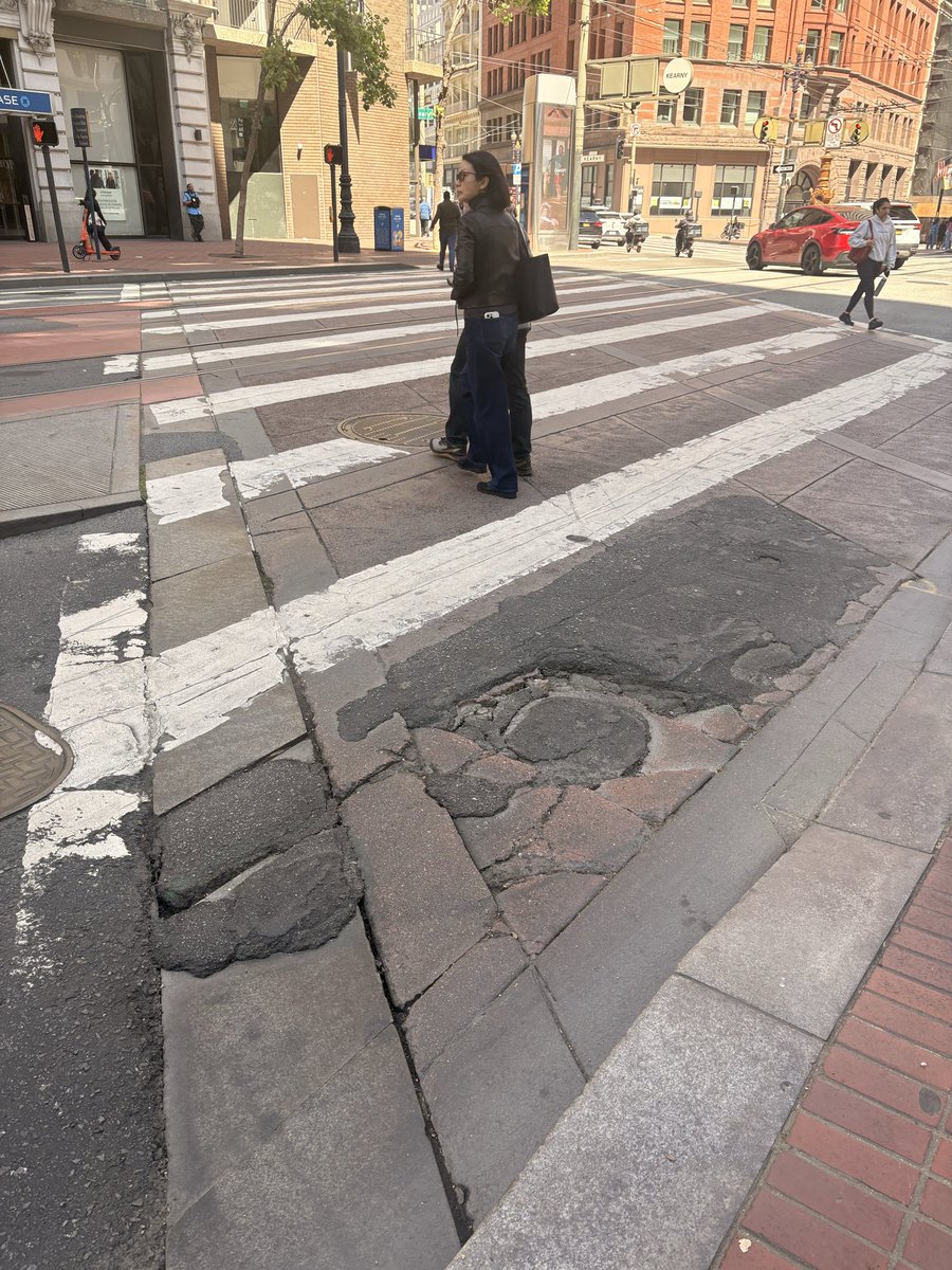 wheres_robert's tweet photo. @sfchronicle @DannySauter @DanielLurie Street conditions looking great! Few for tickets for cyclists should pay for that? https://t.co/CP0fTlzAck