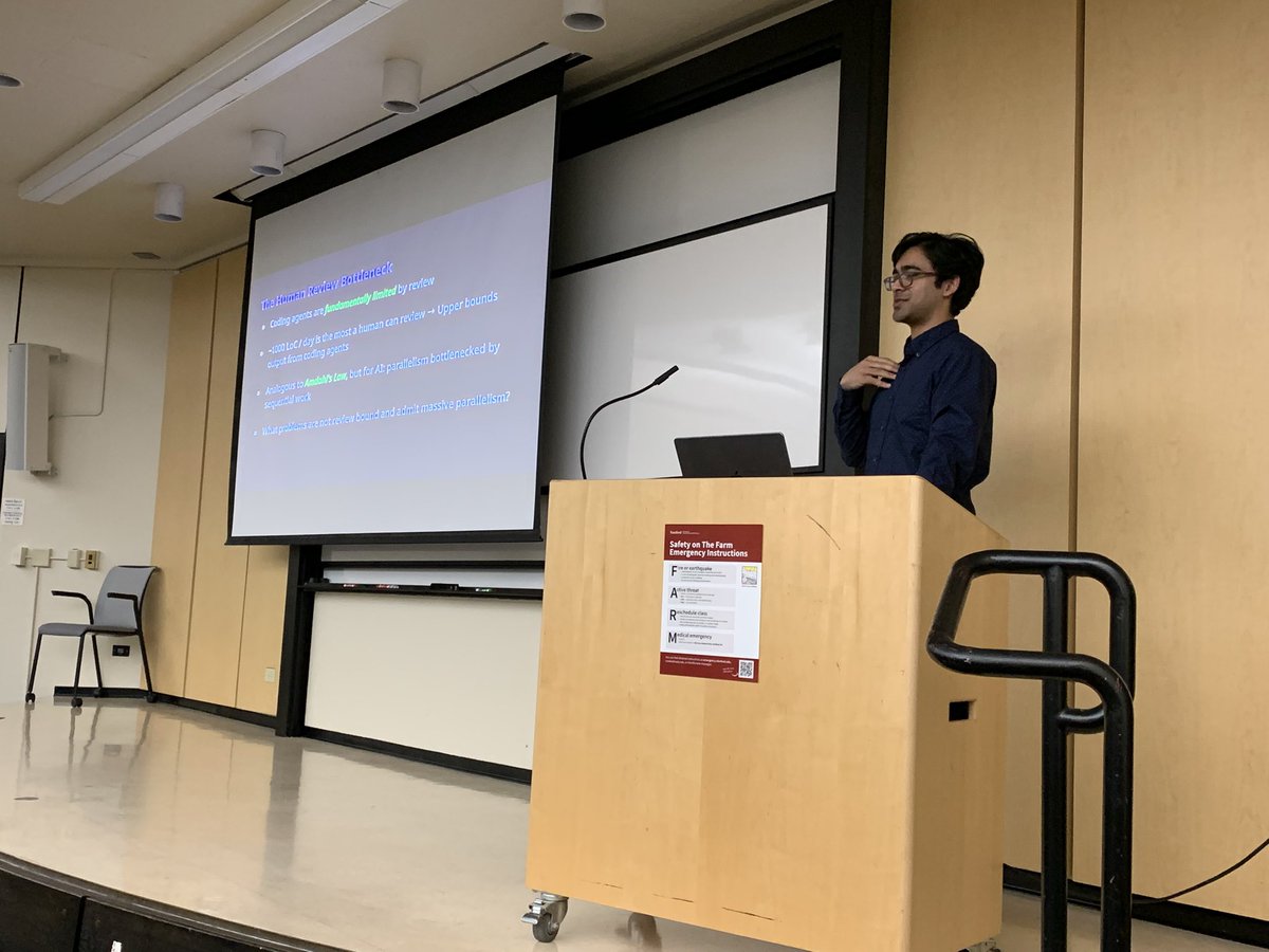 Stanford lecture slide on "The Human Review Bottleneck" showing that coding agents are fundamentally limited by review, with ~1000 LoC/day upper bound and Amdahl's Law analogy