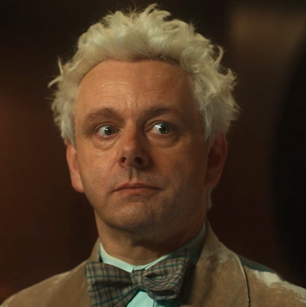 Why is so hard for the fandom to SEE Aziraphale?

Like Shostakovich he listens to at the beginning of S2, Az too is trapped in a dictatorship with NO ESCAPE. Constantly fearing for his loved one, his home, his existence.
He has to pretend and hide and lie and never trust anyone.