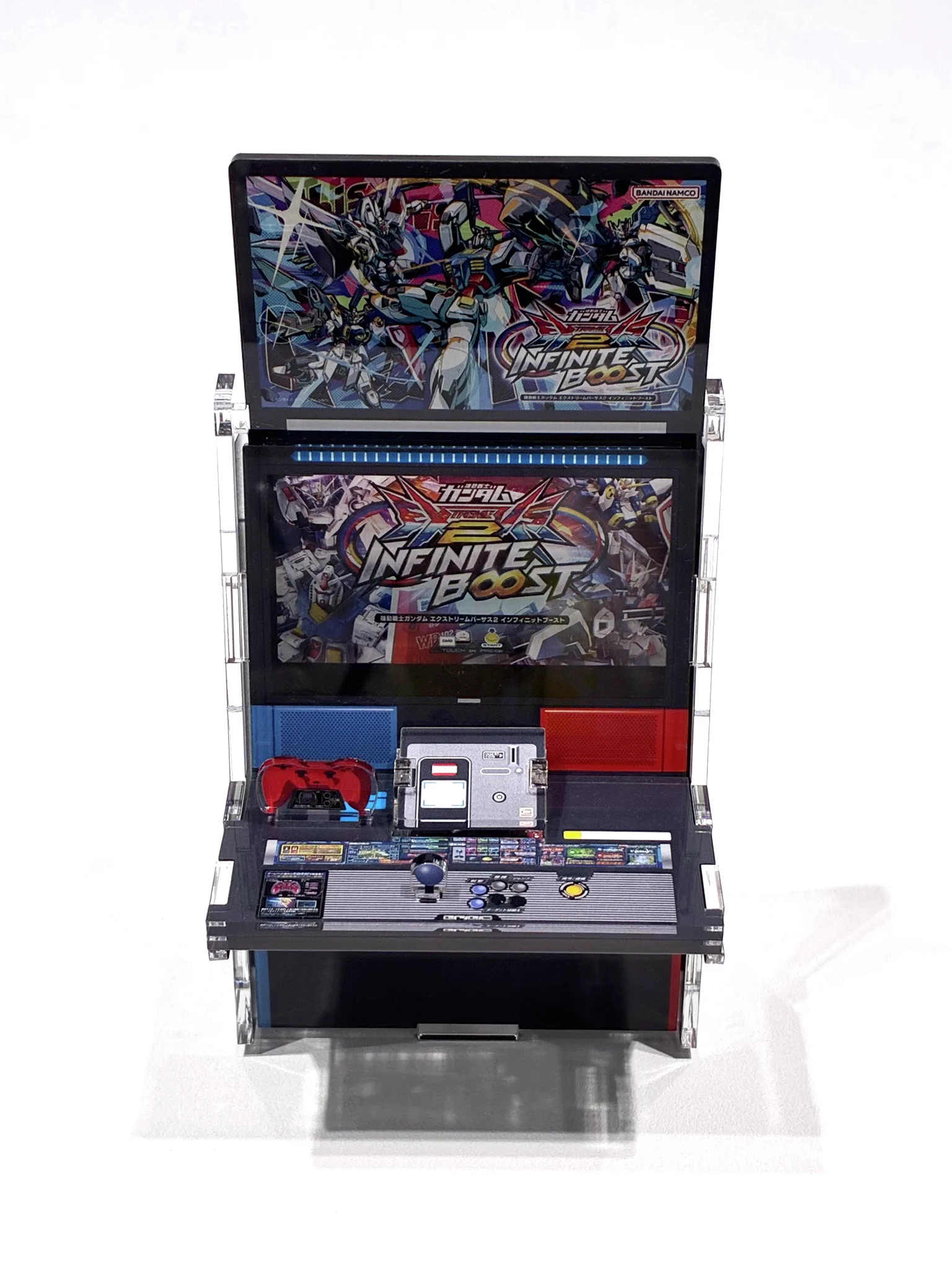 マルイ ガンダム EXVS 筐体型スマホスタンド HFXj4dcakAASG-X?format=webp&