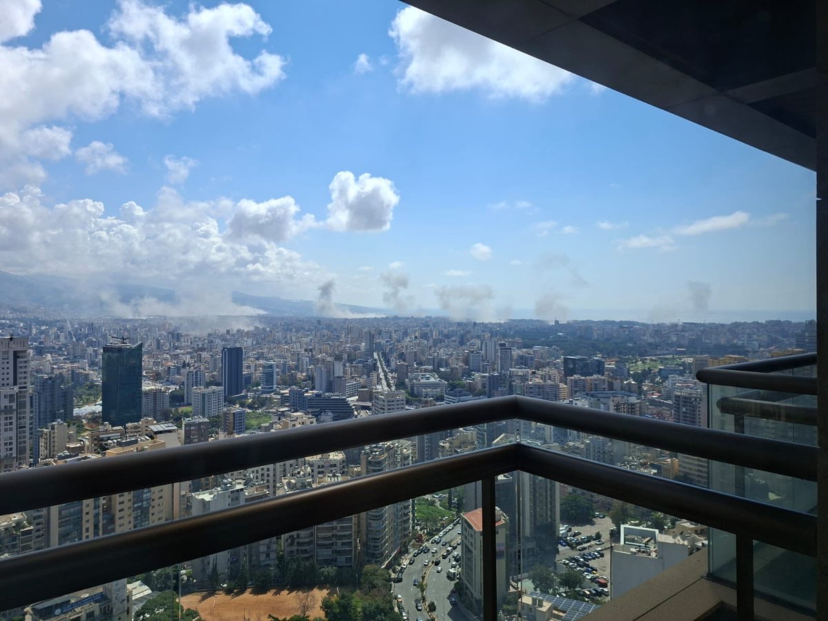 mahamyahya's tweet photo. Multiple strikes in #Beirut - I could hear the whoosh as airplanes flew over us. View from a friend’s home in #Ashrafie #Israel making clear #Lebanon still under fire. https://t.co/qLqA8qD2lv