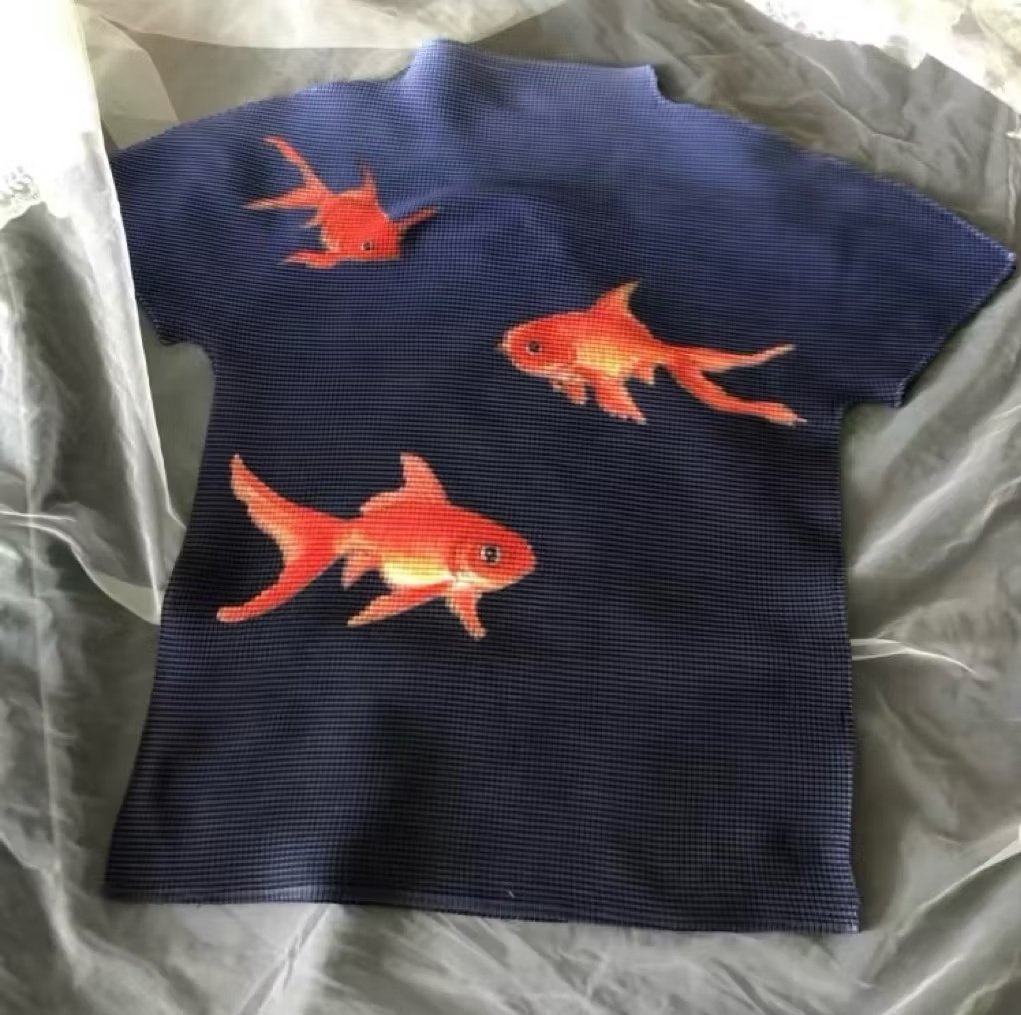 bakpa0w's tweet image. Found a cute knit top with a fish design 🐠🐙⚓