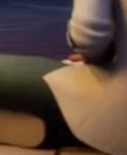 Adrian is holding something in his hand, Something like a paper.