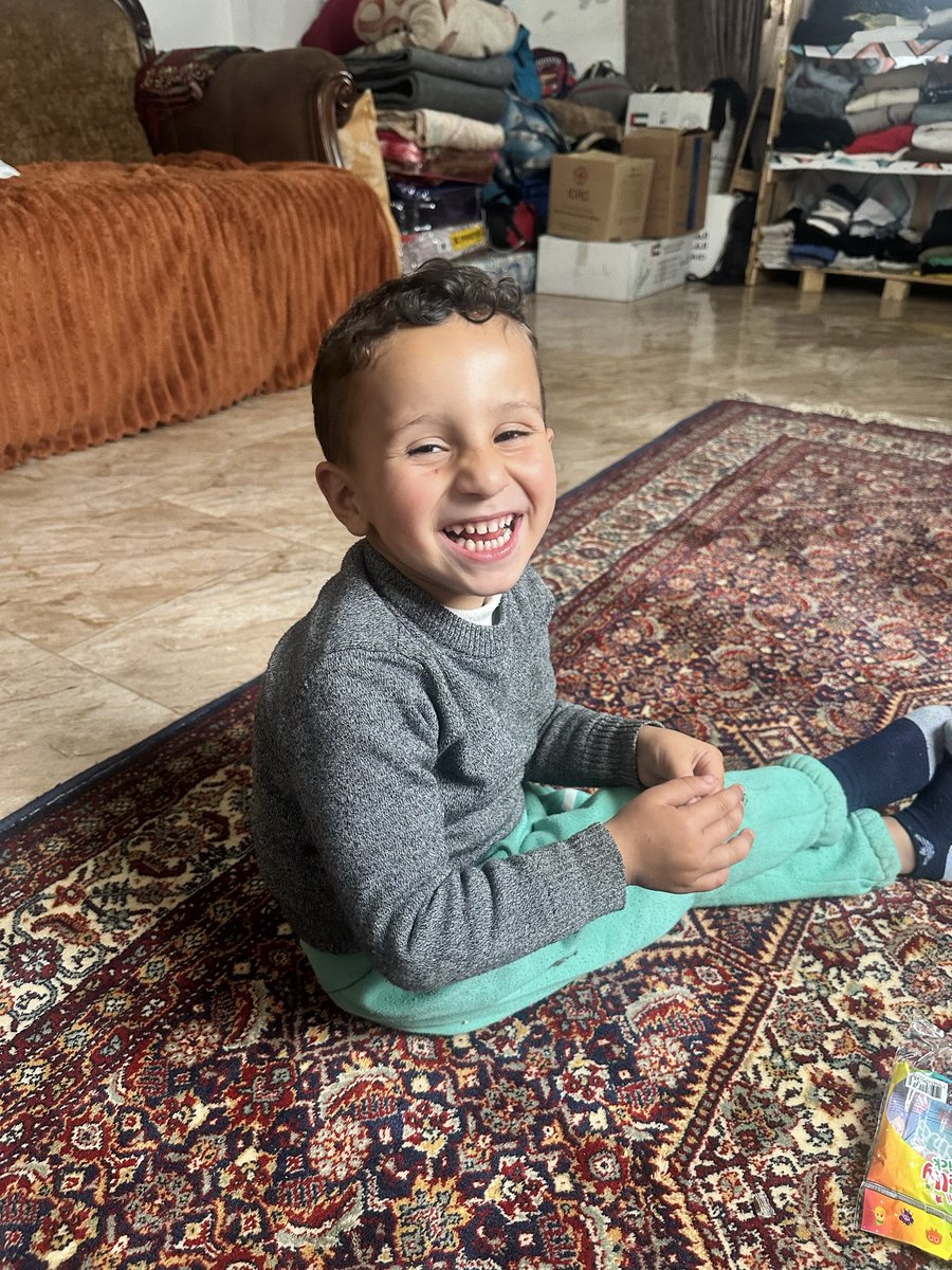 I would give my whole life just to keep this smile on little Mahdi’s face.
Nothing in this world means more to me than seeing his innocent smile.

But here in Gaza, we are living through heavy days surrounded by rubble, hunger, and endless fear.
Every day, we are simply trying to