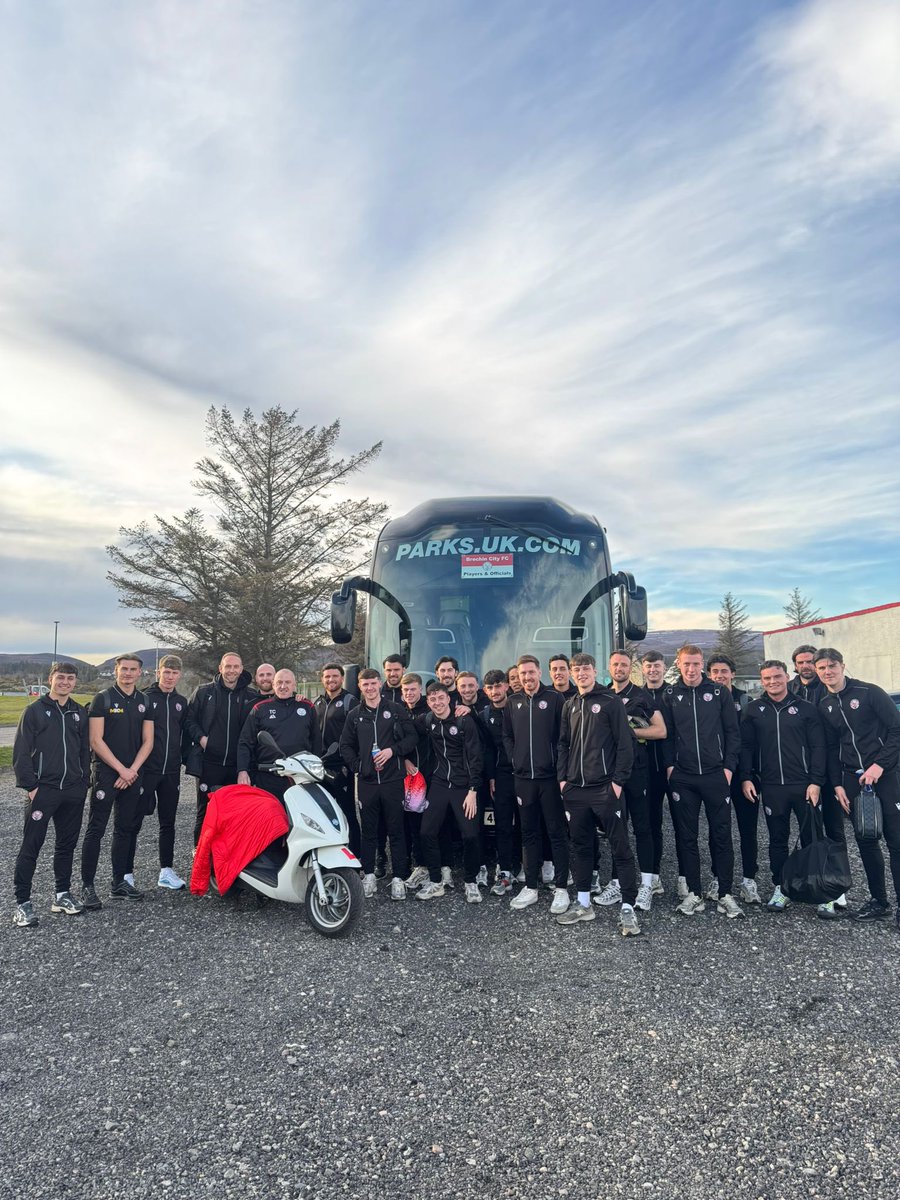 BrechinCityFC's tweet photo. The City squad have arrived at Brora - greeted by Trevor Clark who has made it on his moped scooter! 🛵 https://t.co/R0h1Xz3qGc
