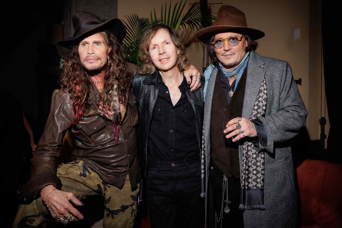 🚨 Don’t let unsaid words haunt you like ghosts of Christmas past.
Johnny Depp just stepped out for a rare LA red carpet at his star-studded Three Hearts Rum launch — rubbing shoulders with rock icons, pouring passion into every detail of his new Caribbean rum brand. And while