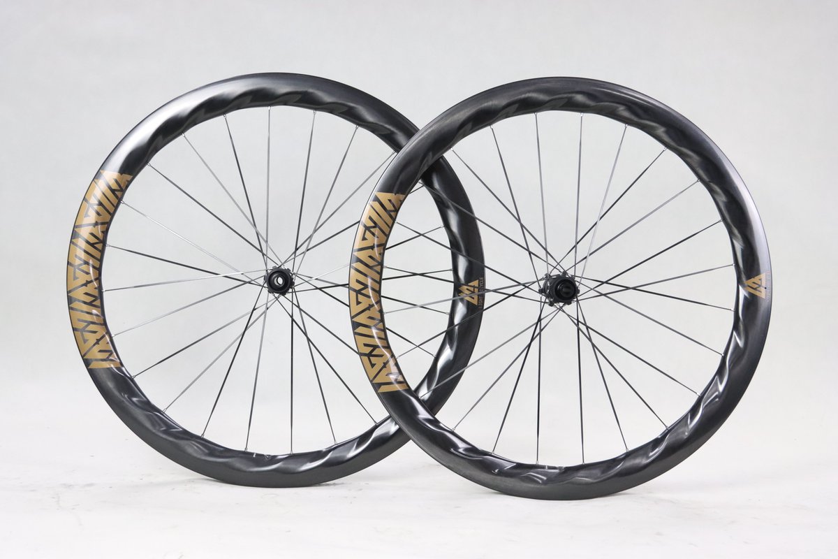 light_bicycle_M's tweet photo. The smallest details make the biggest difference. The unique shape and rim depth of this #Turbo50 wheelset provide aerodynamic advantages. 
📎Impact resistance: 90J.
This wheelset is built with #LightBicycle ThrustLite-3 carbon spokes and #NonPlus carbon spoke hubs. https://t.co/9QQnshuJyU