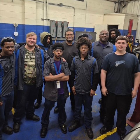 insights2004's tweet photo. At the Cincinnati Job Corps Center, we don’t just talk about excellence—we get under the hood and find it! As part of his Trade Shadowing Initiative, our very own Center Director, Mr. Parker, traded his suit for some grease and joined our powerhouse Automotive trade! https://t.co/7dXUs38cQ0