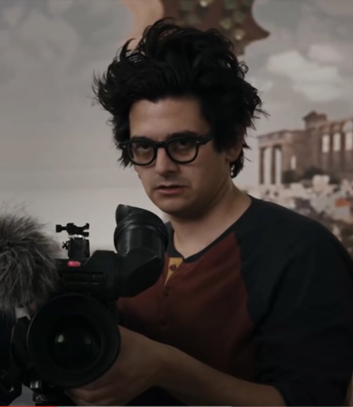 He looks like a fusion of Billie Joe Armstrong and Rivers Cuomo