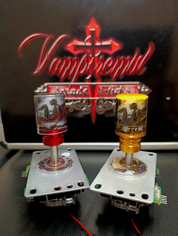 Vampiremul's tweet photo. This week we have a showdown! 
We never repeat designs, but we do maintain differences that make our pieces unique! 

Gold or red, what do you think?

#gaming #arcade #biomechanics #videogames #joystick https://t.co/YnpUkDHPyp