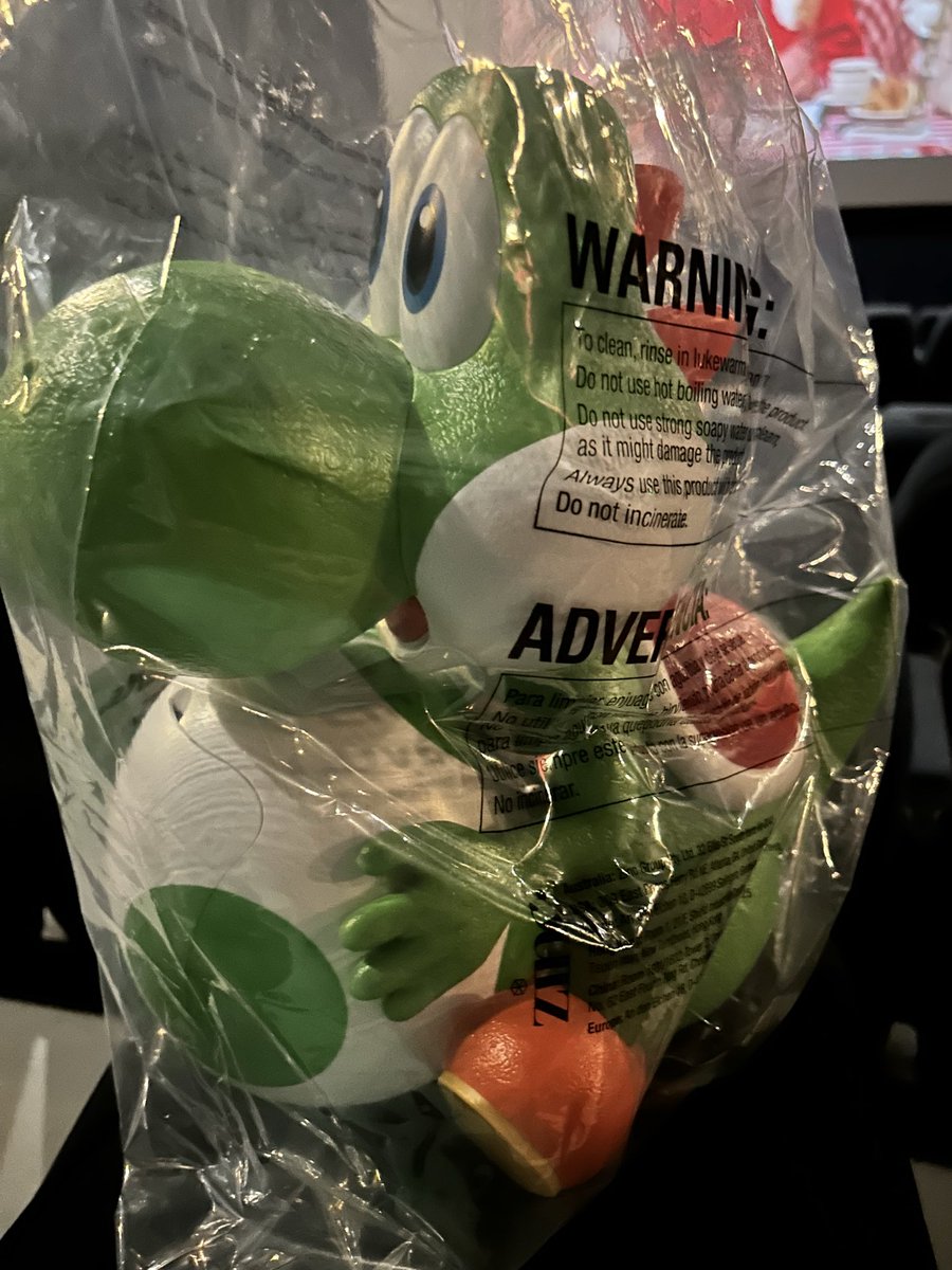 Super Mario Galaxy in 3D last night with the Smith boys! We had to buy the Yoshi popcorn bucket!