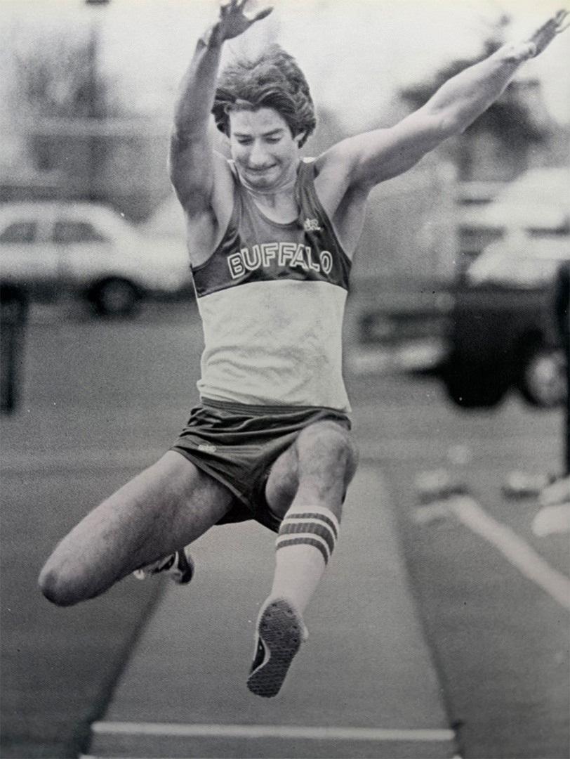 ubalumni's tweet image. #TBT: Remember that final leap toward the last day of class? (This 1989 #UBuffalo track and field triple-jumper might.) Less than a month to go! 💙