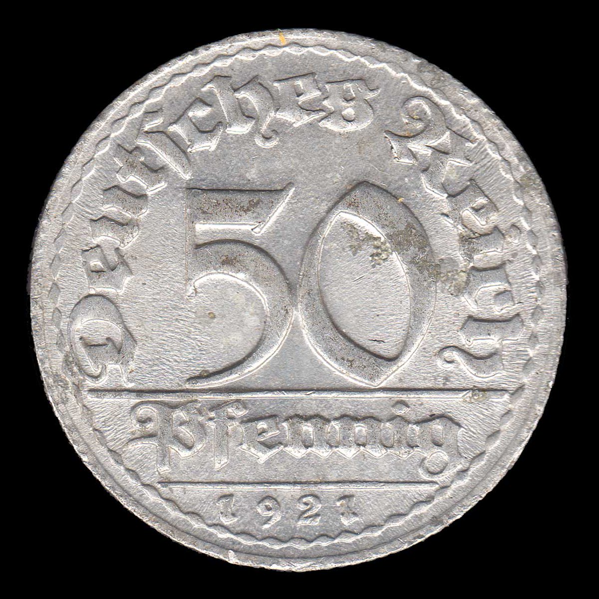 rocketdog632's tweet photo. A Germany 50 Pfennig coin from 1921 minted in Munich. Has quite a few radial metal flow lines on it. A very weak strike. #Coins #Germany https://t.co/jRVA2S5dHn