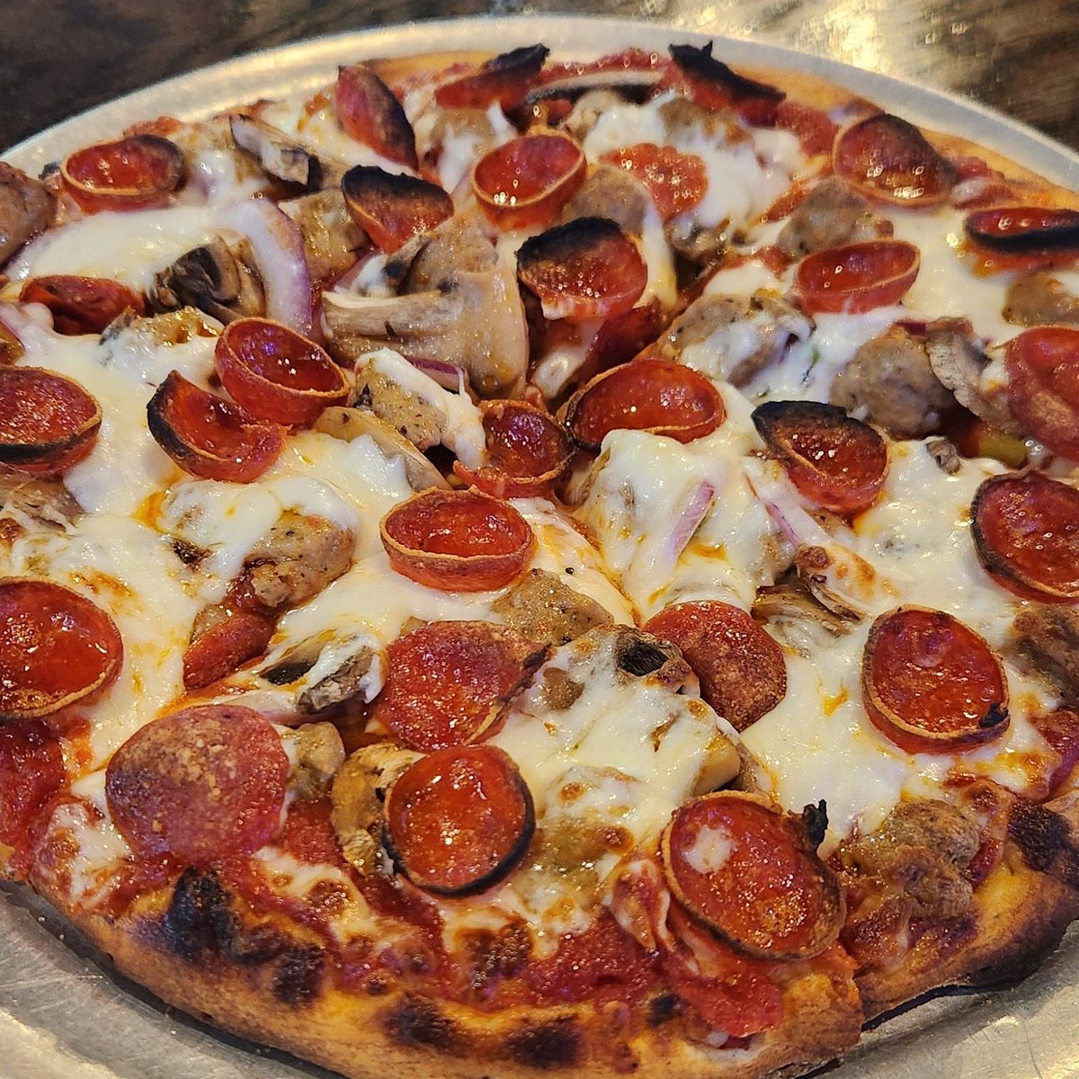 Thursday’s calling, and it’s bringing pizza with it. 🍕🔥 Dive into our Pizza Specials and try the Silverhawk Supreme, stacked with Italian sausage, cup-and-char pepperoni, green peppers, onions, and mushrooms!