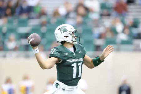 TheCFBNation's tweet image. Michigan State Spartans QB1 Battle Entering 2026:

⚪ Cam Fancher - 60.4%, 5,627 Yds, 27 TDs, 1,292 Rush Yds, 9 Rush TDs ( Marshall, FAU, UCF)
⚪ Alessio Milivojevic - 64.2%, 1,267 Yds, 10 TDs (2025)

Let Us Know Who You Think Wins The Spartans QB1 Job

#GoCFB #CollegeFootball