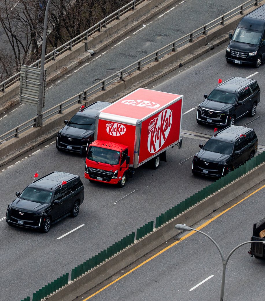 AteeqNaseem's tweet photo. #KitKat Canada sent a delivery truck through Toronto with a full security escort.

For chocolate.

Two weeks after the heist and they're still milking it.

Most brands extinguish a fire. The best ones warm their hands on it. 🍫

#KitKatHeist #Marketing #Nestle https://t.co/bX3Ss06UVf