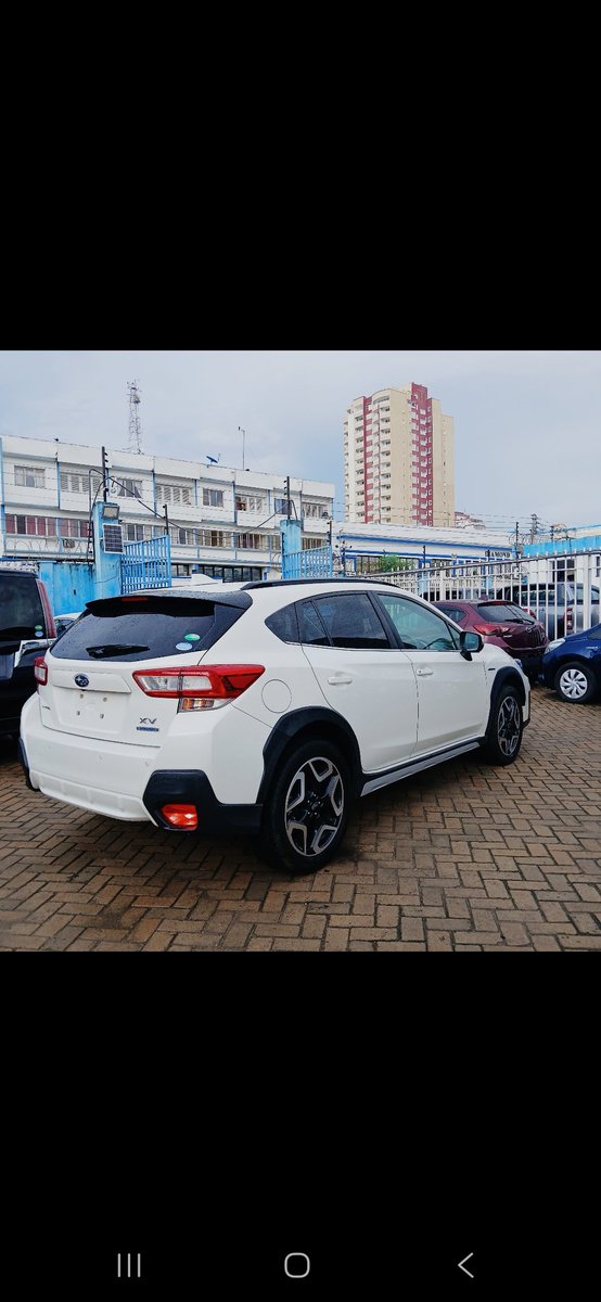 KAutozone's tweet photo. *Subaru XV Hybrid Advance Package E-Boxer*

Model: 2019
Engine: 2000Cc
Fuel: Petrol
Transmission: Automatic 
Drive:  Symmetrical AWD
Colour: Pearl White 
Mileage: 104,000
Registration: New

*Features:* 
- Keyless Entry and Start 
- Power Windows and Mirrors 
- Power Adjustable Front Seats 
- Dual-zone Automatic Climate Control 
- Touchscreen Infotainment System
- USB Inputs
- Multi-function Steering Wheel 
- Bluetooth Hands-free Phone and Audio
- Subaru Eyesight Technology 
- Traction Control 
- Pre-Collision Braking System 
- Adaptive Cruise Control 
- Lane Departure Warning 
- Lane Assist 
- Blind Spot Monitoring
- Front and Rear Cameras
- LED Headlights and Taillights 
- Subaru Steering responsive Headlights 
- LED Daytime Running Lights 
- Fog Lights 
- Factory Alloy Wheels 
- Subaru X-MODE
- Hill Descent Control 
- Electric Handbrake
- Comfortable Fabric Seats