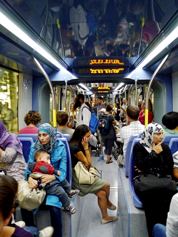 iguinerman's tweet photo. @clashreport Yes, the situation is terrible for arabs in Israel, they can't even ride the train!... Come on! I actually live here! My wife works at the hospital in Jerusalem, everyday she cares for Palestinian patients, stop spreading lies. https://t.co/YM10ntpRRn