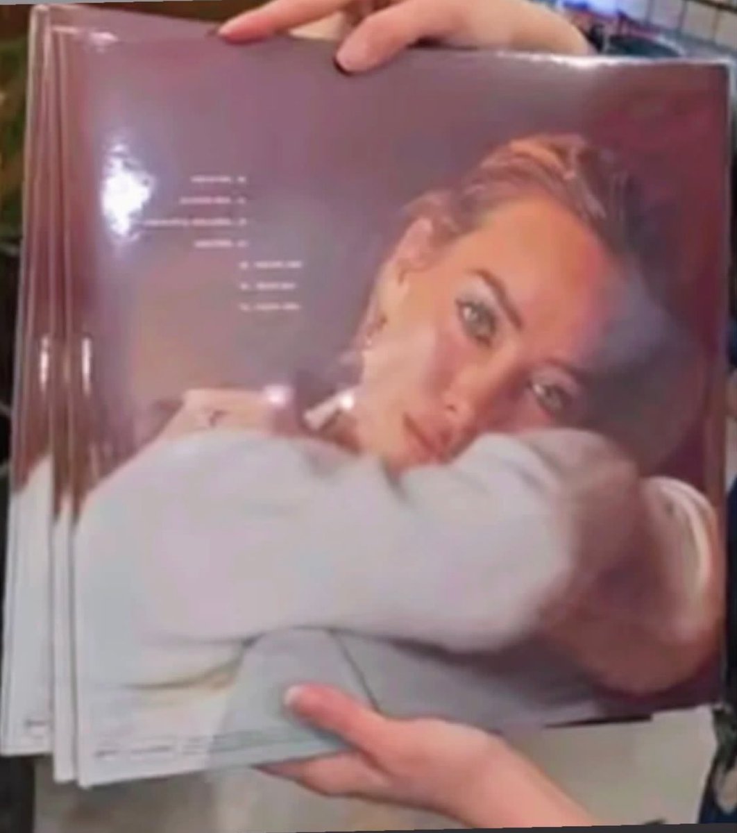 HiLiran_israel's tweet photo. Spotted 👀 Here’s how the back of the Hilary Duff – (Mine) 1LP Silver Vinyl looks!! #HilaryDuff #vinyl #PhysicalMedia #LuckOrSomething #music #cd #album #duffender #teamduff https://t.co/PlzKHcbAvw